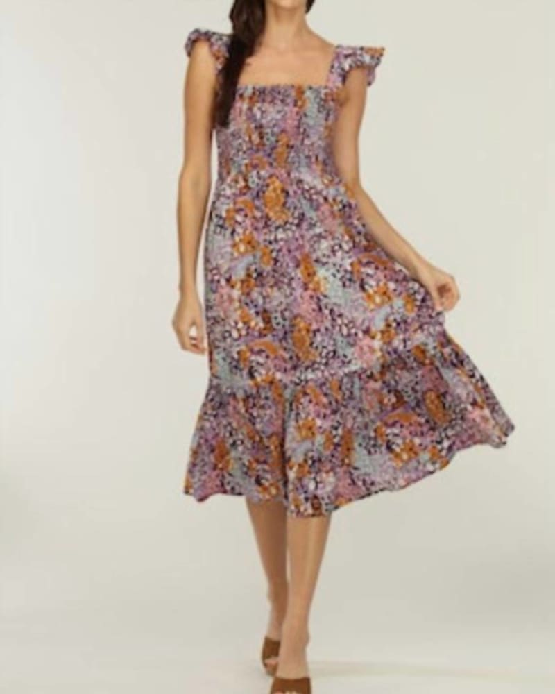 Front of a model wearing a size L Rylan Smocked Midi Dress in Multi in Multi by Veronica M. | dia_product_style_image_id:336010